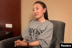 澳大利亚华裔杨恒均的妻子袁小靚在上海接受路透社的采访。(2020年10月19日)