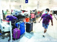 国际航空网络超荷恶果显现 国内航班过半遭延误或取消(图)