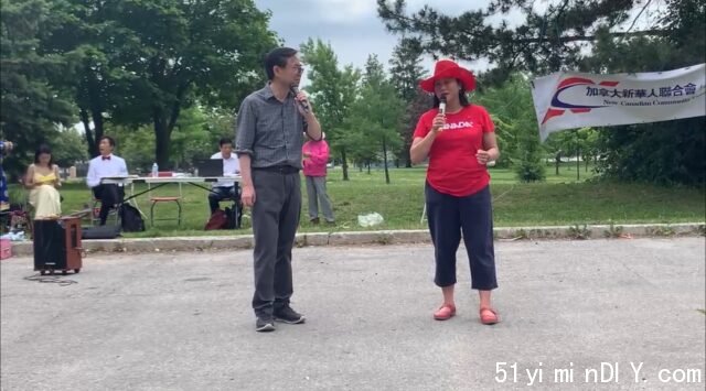 A person and person standing in a parking lot Description automatically generated with low confidence