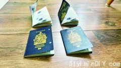 新版护照遇潮首页易卷曲(组图)